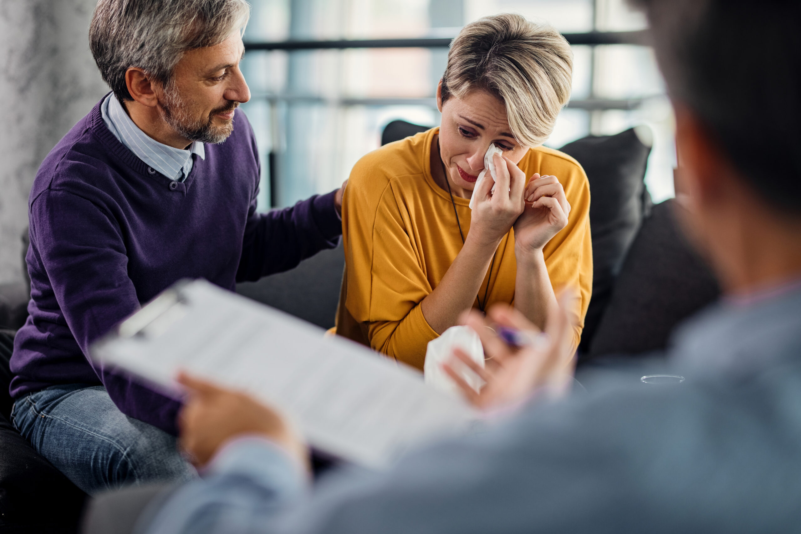 Columbia, SC Sad woman crying while being with her husband about filing a late personal injury claim in South Carolina